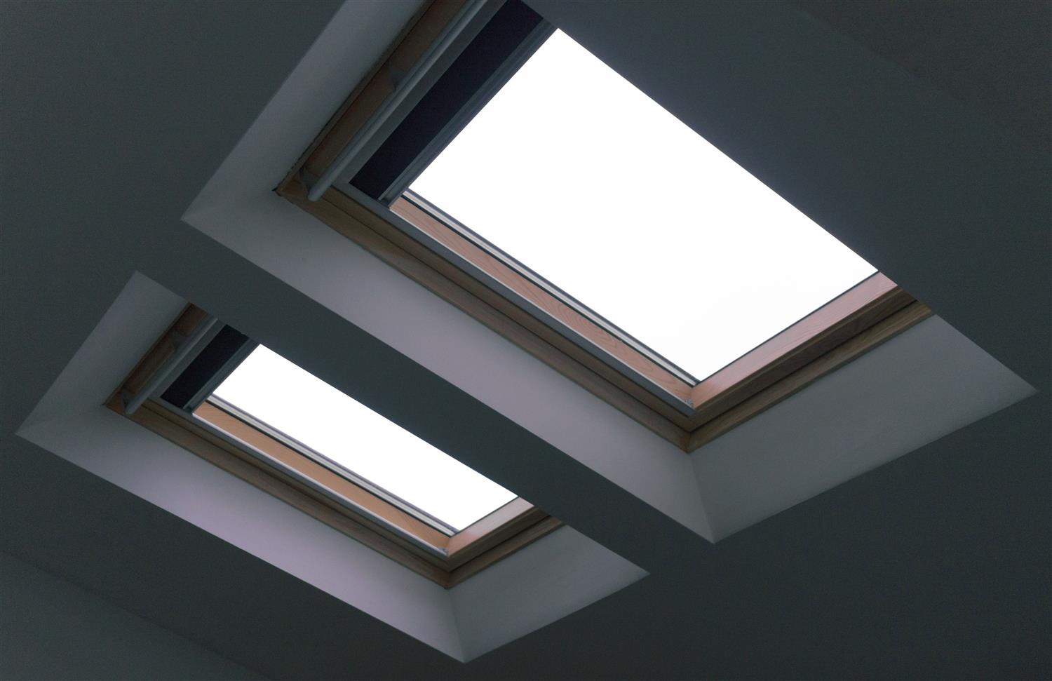 Interior view of two properly sealed skylights letting in natural light
